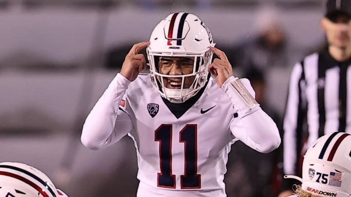 Nov 5, 2022; Salt Lake City, Utah, USA; Arizona Wildcats quarterback Noah Fifita (11) changes a play at the line of scrimmage against the Utah Utes in the fourth quarter at Rice-Eccles Stadium