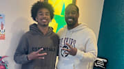 Oklahoma receiver recruit and Mason James meets UW receivers coach Kevin Cummings. 
