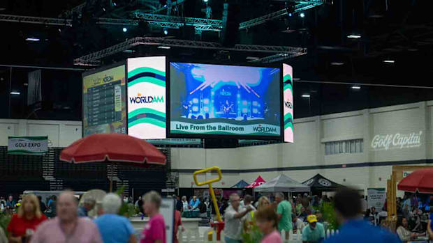 The big screens above the convention center floor at the Myrtle Beach World Am.