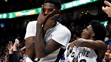 Mississippi State’s Shawn Jones Jr., left, and Josh Hubbard (12) celebrate from the bench after a teammate scored against LSU during a NCAA college basketball first round game at the men’s Southeastern Conference Tournament Wednesday, March 12, 2025, in Nashville, Tenn.