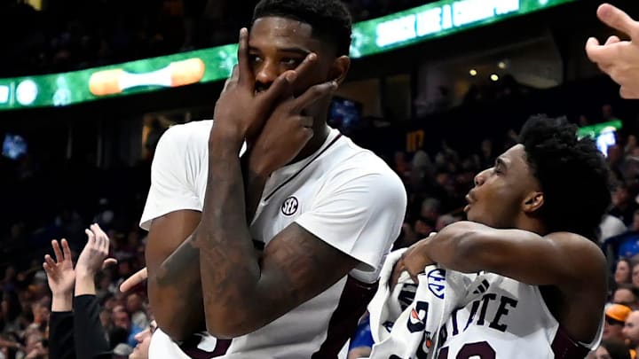 Mississippi State’s Shawn Jones Jr., left, and Josh Hubbard (12) celebrate from the bench after a teammate scored against LSU during a NCAA college basketball first round game at the men’s Southeastern Conference Tournament Wednesday, March 12, 2025, in Nashville, Tenn.