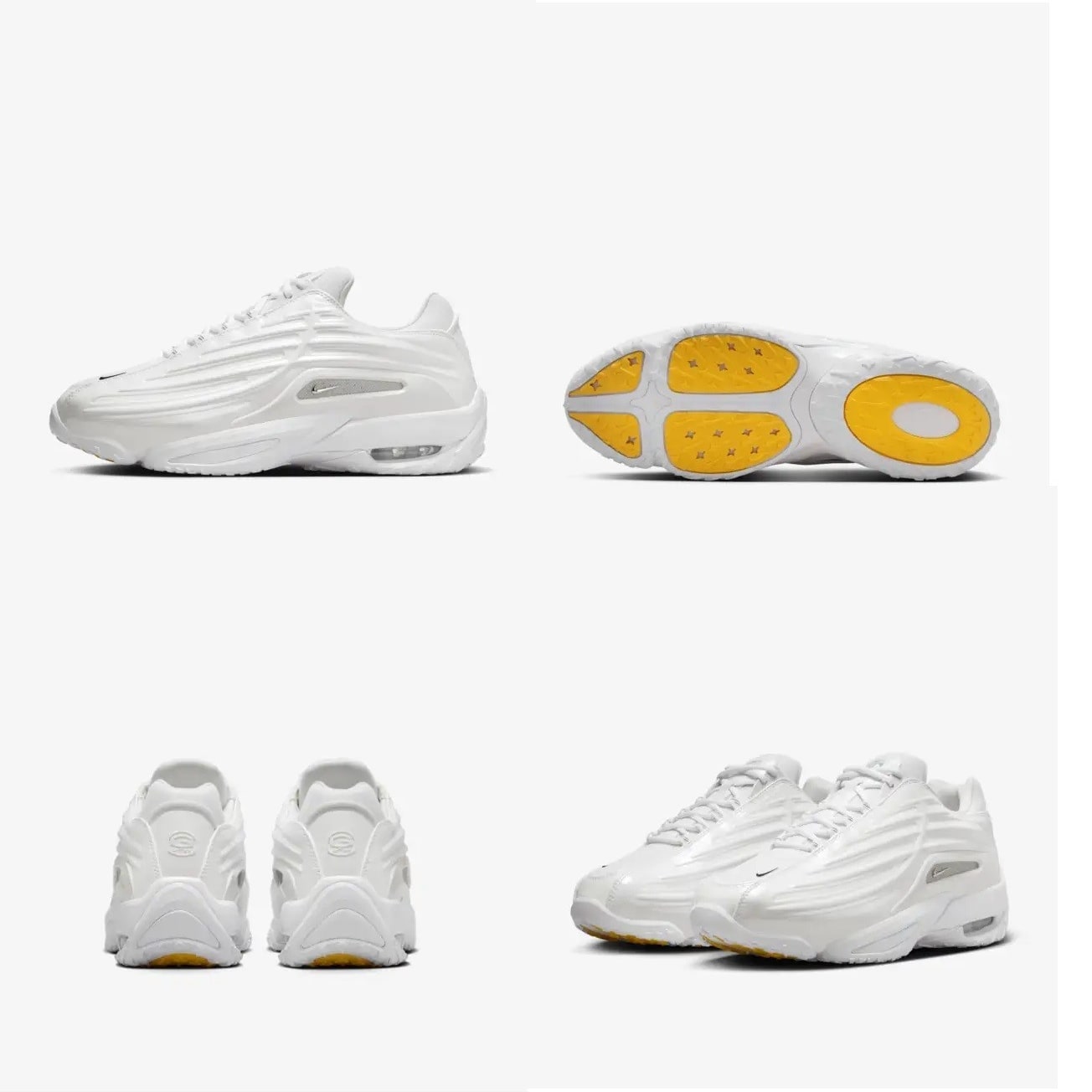 Side view of Drake's white and gold Nike sneakers.