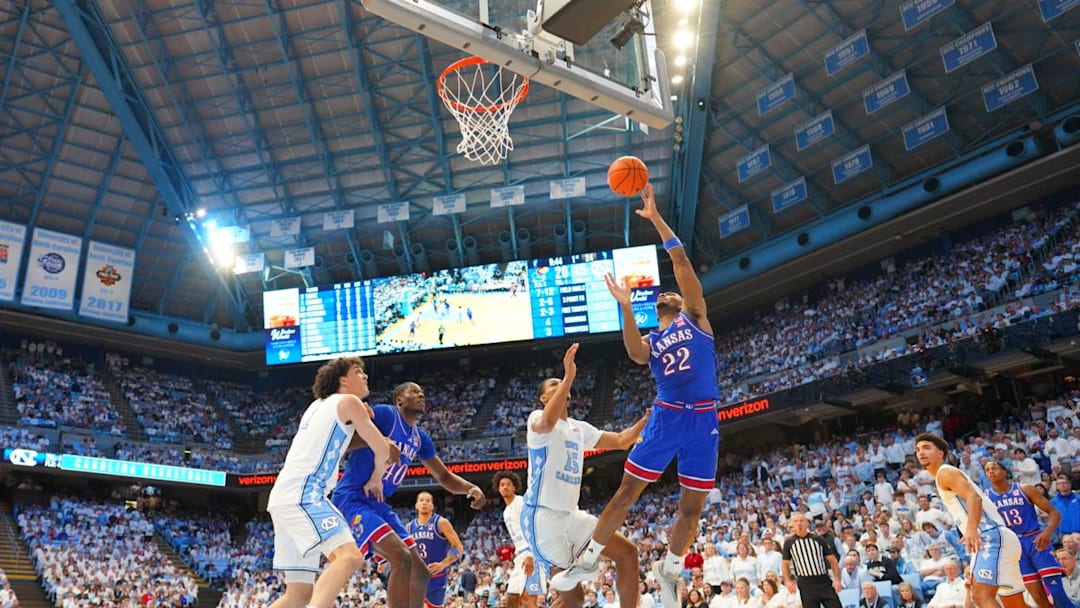 Nov 7, 2025; Chapel Hill, North Carolina, USA; Kansas Jayhawks guard Darryn Peterson (22) shoots as North Carolina Tar Heels forward Jarin Stevenson (15) defends in the first half at Dean E. Smith Center. Mandatory Credit: Bob Donnan-Imagn Images Nov 7, 2025; Chapel Hill, North Carolina, USA; Kansas Jayhawks guard Darryn Peterson (22) shoots as North Carolina Tar Heels forward Jarin Stevenson (15) defends in the first half at Dean E. Smith Center. Mandatory Credit: Bob Donnan-Imagn Images