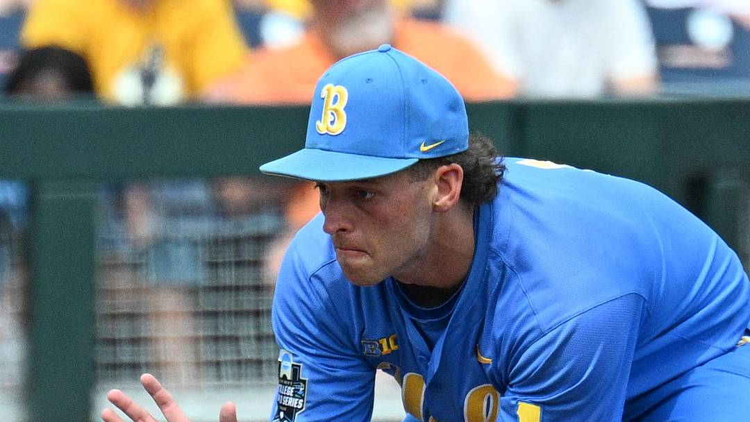 Jun 14, 2025; Omaha, Neb, USA;  UCLA Bruins shortstop Roch Cholowsky (1) fields a ground ball against the Murray State Racers during the ninth inning at Charles Schwab Field. Mandatory Credit: Steven Branscombe-Imagn Images