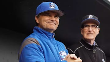 Creighton Bluejays coach Ed Servais in the dugout before a game.