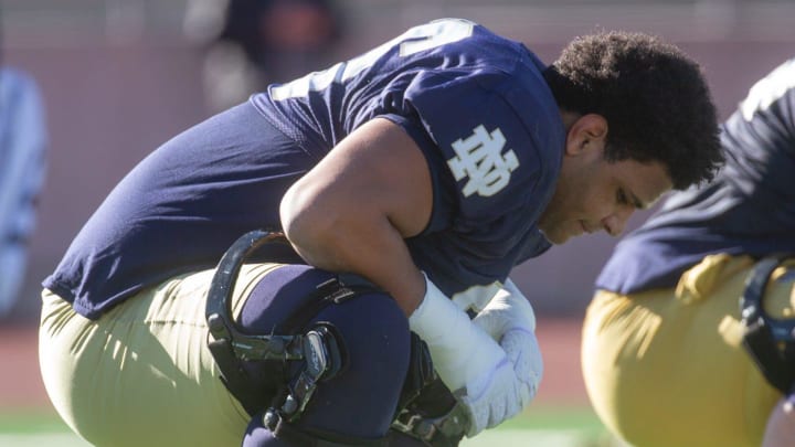 Notre Dames Charles Jagusah stretches during practice at the SAC on Dec. 26, 2023, as they prepare for the Tony the Tiger Sun Bowl against Oregon State.