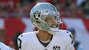 Dec 8, 2024; Tampa, Florida, USA; Las Vegas Raiders quarterback Desmond Ridder (10) drops back against the Tampa Bay Buccaneers during the second half at Raymond James Stadium. Mandatory Credit: Kim Klement Neitzel-Imagn Images