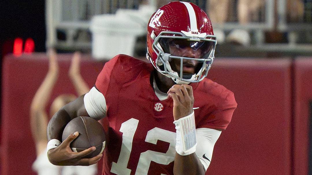 Alabama quarterback Keelon Russell (12) scrambles out of the pocket during the game with South Carolina at Saban Field at Bryant Denny Stadium. 