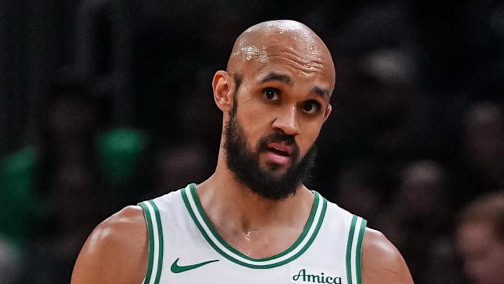 Apr 7, 2026; Boston, Massachusetts, USA; Boston Celtics head coach Joe Mazzulla with guard Derrick White (9) from the sideline as they take on the Charlotte Hornets at TD Garden. Mandatory Credit: David Butler II-Imagn Images