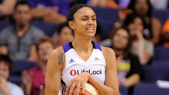 Jun. 15, 2012; Phoenix, AZ, USA; Phoenix Mercury forward Candice Dupree (4) reacts on the court after a play against the Minnesota Lynx during the second half at US Airways Center. The Lynx defeated the Mercury 78-60. Mandatory Credit: Jennifer Stewart-Imagn Images