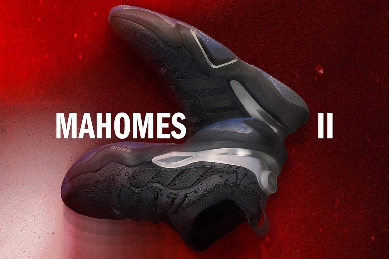 Side view of Patrick Mahomes' black and silver adidas sneakers.