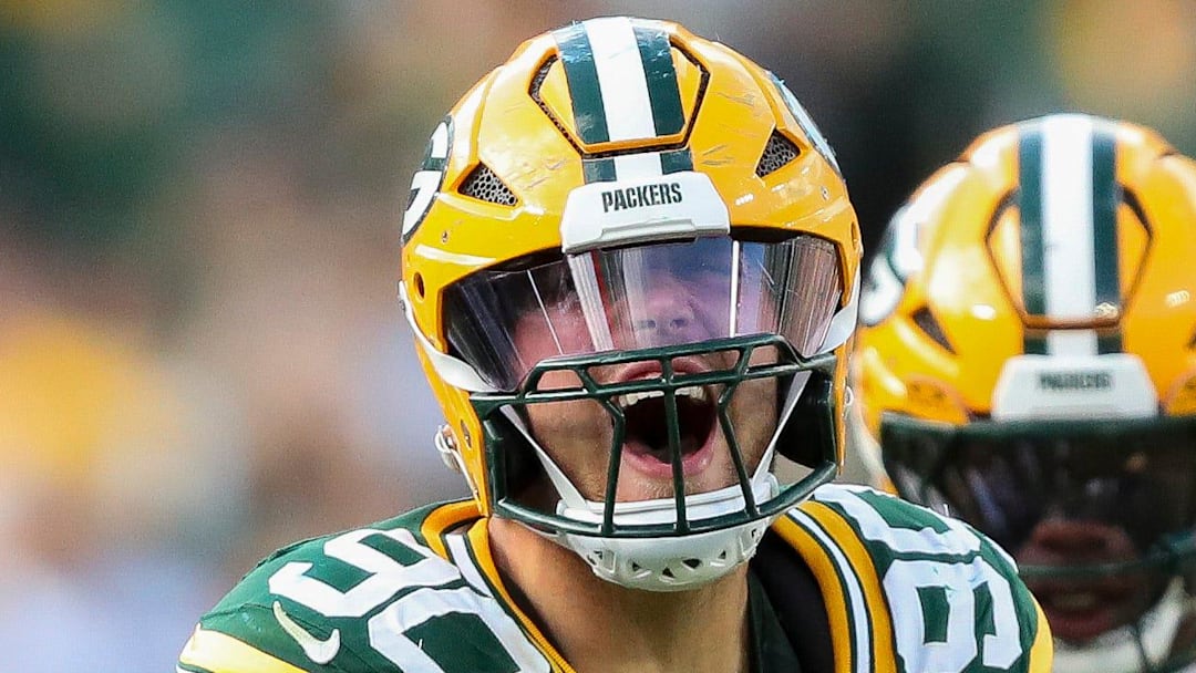 Green Bay Packers defensive end Lukas Van Ness (90) celebrates after sacking Detroit Lions quarterback Jared Goff.