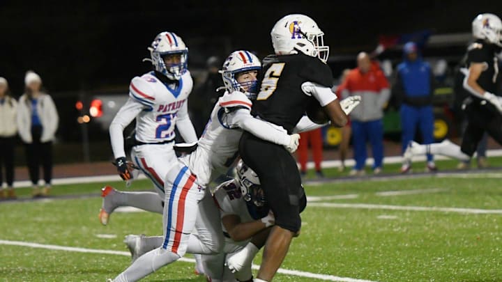 John Curtis (in white) vs. Alexandria in the 2024 Division I select semifinals. John Curtis (in white) vs. Alexandria in the 2024 Division I select semifinals.