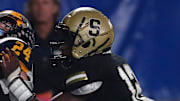 Swainsboro's Bryson Tarver (12) defends a pass in the 2023 GHSA high school football Class A Division 1 state championship game.