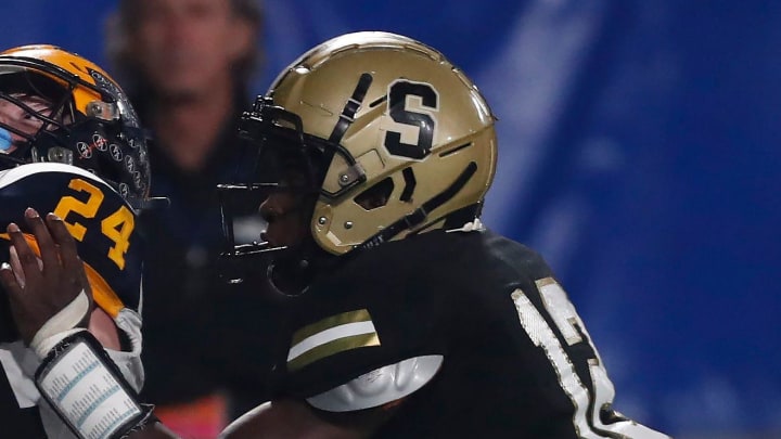 Swainsboro's Bryson Tarver (12) defends a pass in the 2023 GHSA high school football Class A Division 1 state championship game.