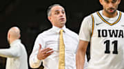 Iowa Hawkeyes head coach Ben McCollum