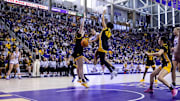 Iowa Hawkeyes' Hannah Stuelke (45) contests a shot