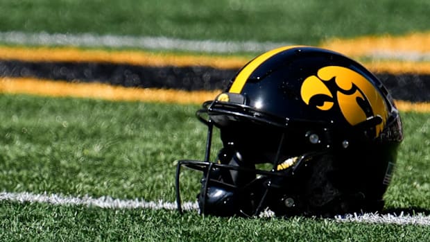 An Iowa Hawkeyes helmet rests on their home field prior to hosting the Indiana Hoosiers