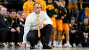 Iowa Hawkeyes head coach Ben McCollum