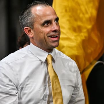 Iowa Hawkeyes head coach Ben McCollum