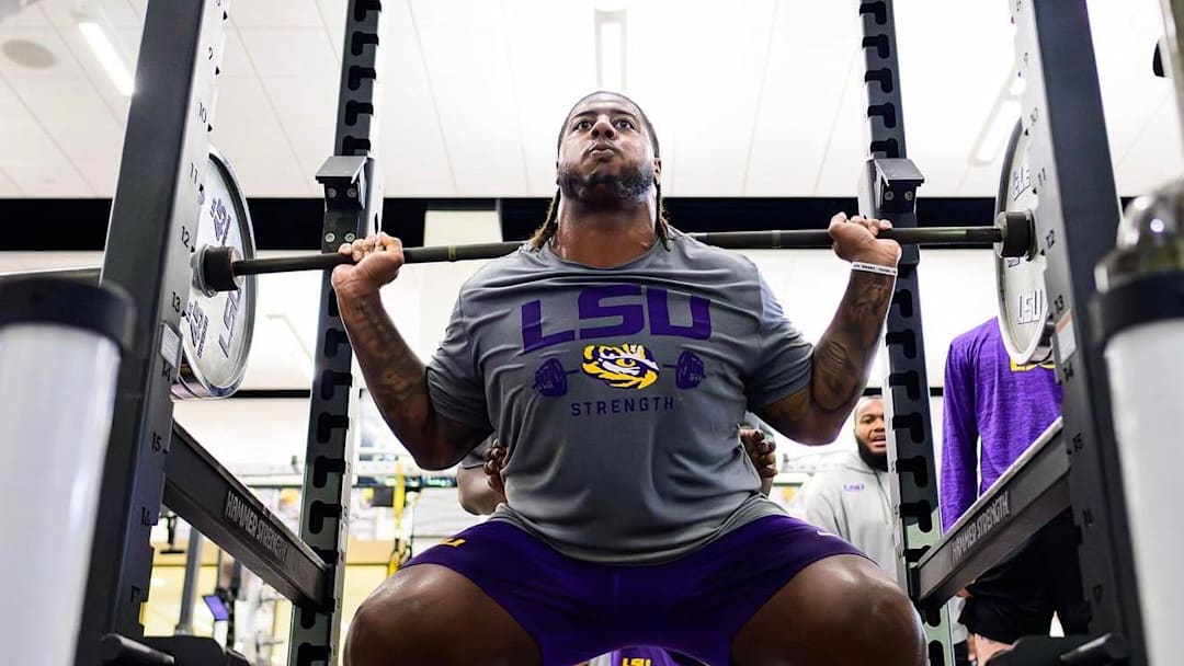 LSU Tigers Offensive Tackle Jordan Seaton Squatting