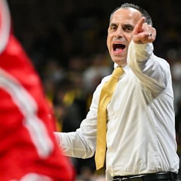 Iowa Hawkeyes head coach Ben McCollum