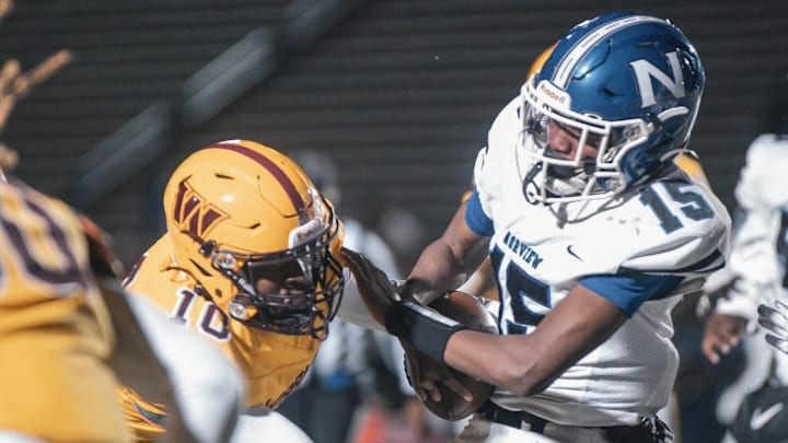 Warwick High School LB makes a critical tackle against Norview. Warwick High School LB makes a critical tackle against Norview.