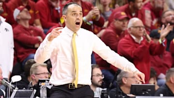 Iowa Hawkeyes head coach Ben McCollum