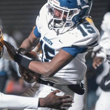 Warwick High School LB Tracy Pope Jr. makes a critical tackle against Norview.