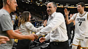 Iowa Hawkeyes head coach Ben McCollum