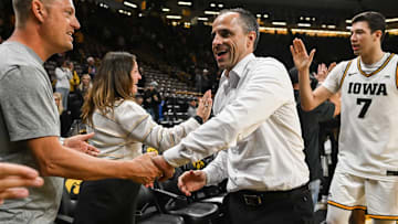 Iowa Hawkeyes head coach Ben McCollum