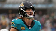 Dec 7, 2025; Jacksonville, Florida, USA; Jacksonville Jaguars quarterback Trevor Lawrence (16) runs downfield after throwing a touchdown pass against the Indianapolis Colts during the first half at EverBank Stadium. Mandatory Credit: Matt Pendleton-Imagn Images