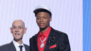 Jun 25, 2025; Brooklyn, NY, USA;  Ace Bailey stands with NBA commissioner Adam Silver after being selected as the fifth pick by the Utah Jazz in the first round of the 2025 NBA Draft at Barclays Center. Mandatory Credit: Brad Penner-Imagn Images