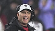 Dec 28, 2024; Annapolis, MD, USA;  North Carolina State Wolfpack head coach Dave Doeren reacts after a play during the first half of the Go Bowling Military Bowl at Navy-Marine Corps Memorial Stadium. Mandatory Credit: Tommy Gilligan-Imagn Images
