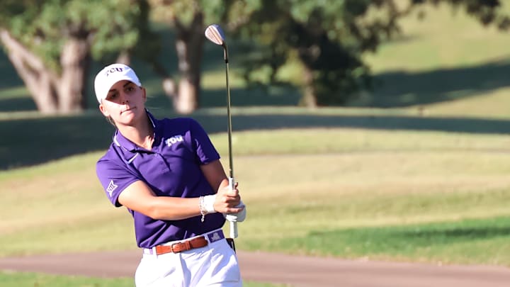 Senior Captain Meagan Winans making her approach shot into the green earlier this season. Senior Captain Meagan Winans making her approach shot into the green earlier this season.
