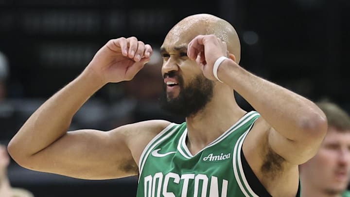 Feb 4, 2026; Houston, Texas, USA; Boston Celtics guard Derrick White (9) reacts after a play during the third quarter against the Houston Rockets at Toyota Center. Mandatory Credit: Troy Taormina-Imagn Images