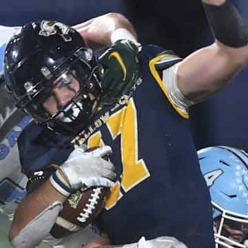 Stephenville's Tate Maruska is tackled by a China Spring defender in the fourth quarter. Stephenville beat the Cougars 31-21 in the District 5-4A Division I game. China Spring will have a new coach in 2026. 