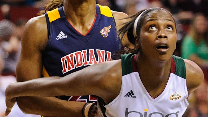 Aug 23, 2012; Seattle, WA, USA; Seattle Storm forward Camille Little (20) blocks out Indiana Fever forward Tamika Catchings (24) during the game at KeyArena. Indiana defeated Seattle 68-66. Mandatory Credit: Steven Bisig-Imagn Images