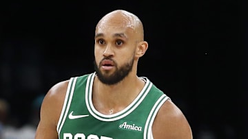 Oct 8, 2025; Memphis, Tennessee, USA; Boston Celtics guard Derrick White (9) looks on during the second quarter against the Memphis Grizzlies at FedExForum.