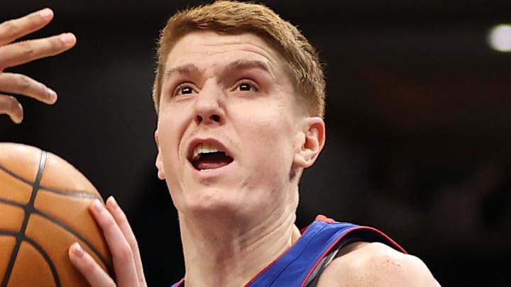 Detroit Pistons guard Kevin Huerter (27) drives past Washington Wizards guard Will Riley (27) during the first half at Capital One Arena on Mar 17, 2026.