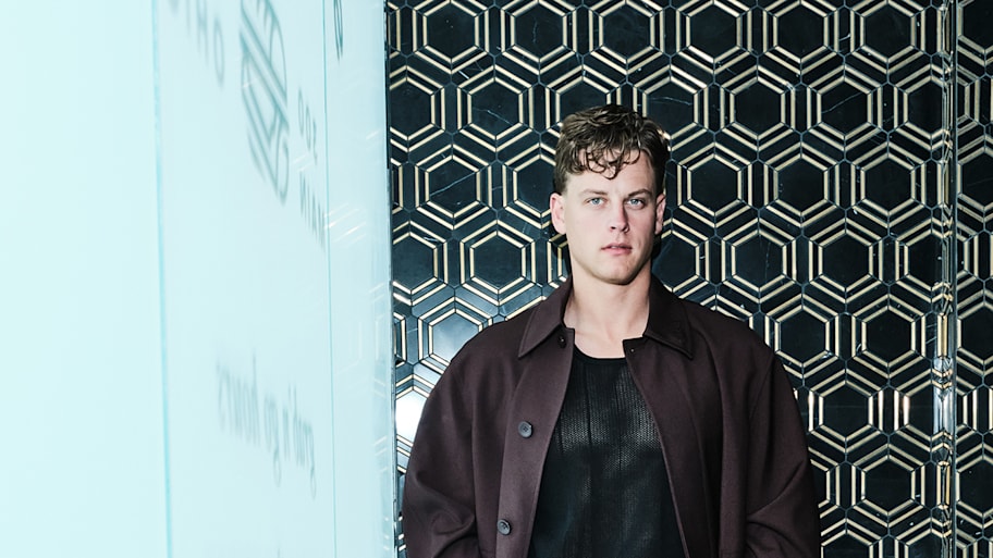 Joe Burrow poses against a wall