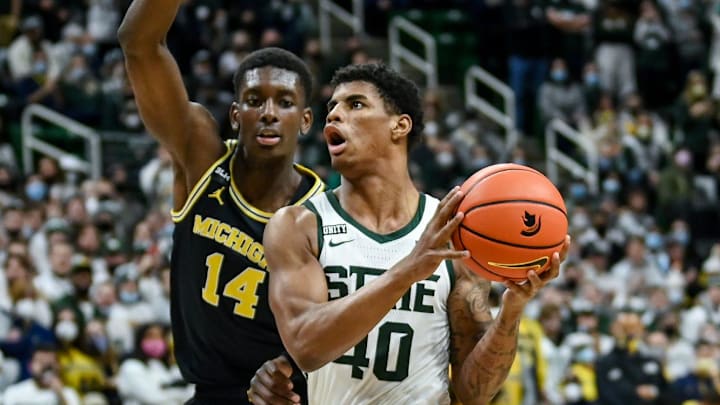 Michigan State's Keon Coleman, right, drives to the basket as Michigan's Moussa Diabate defends during the second half on Saturday, Jan. 29, 2022, at the Breslin Center in East Lansing Michigan State's Keon Coleman, right, drives to the basket as Michigan's Moussa Diabate defends during the second half on Saturday, Jan. 29, 2022, at the Breslin Center in East Lansing