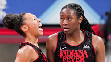 Indiana Fever guard Aerial Powers (23) celebrates Indiana Fever forward Aliyah Boston (7) on Tuesday, Sept. 16, 2025, during Game 2 of a WNBA playoff matchup between the Indiana Fever and the Atlanta Dream at Gainbridge Fieldhouse in Indianapolis. The Indiana Fever defeated the Atlanta Dream, 77-60.