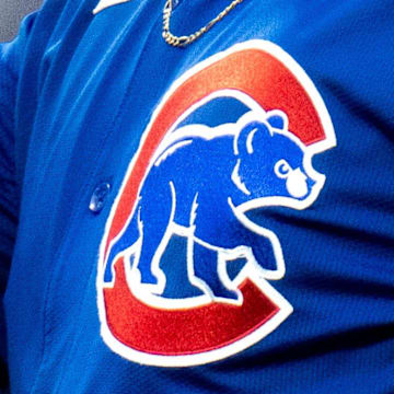 Chicago Cubs logo on the chest of a jersey.