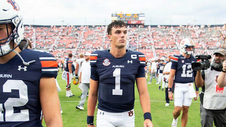 Auburn Tigers quarterback Payton Thorne walks off the field after a four-interceptions performance in a 21-14 loss to Cal.