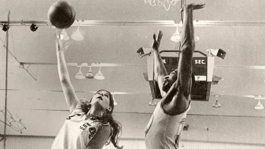 Warriors draft pick Denise Long Rife shooting over Nate Thurmond, June 6, 1969