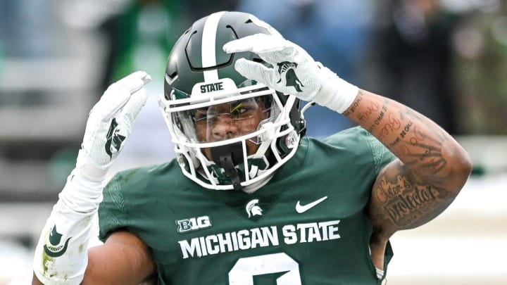 Michigan State's Keon Coleman celebrates his touchdown against Indiana during the second quarter on