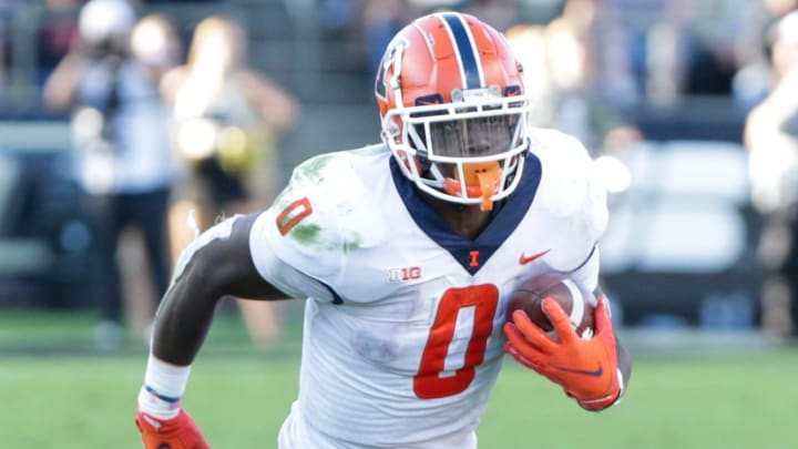 Illinois running back Josh McCray (0) runs the ball during the third quarter of an NCAA college football game, Saturday, Sept. 25, 2021 at Ross-Ade Stadium in West Lafayette, Ind.

Cfb Purdue Vs Illinois