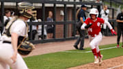 Indiana's Kinsey Mitchell heads to the plate to try to score in a recent game against Purdue. Indiana plays in the Fayetteville Regional and plays Oklahoma State in their first game on May 16.