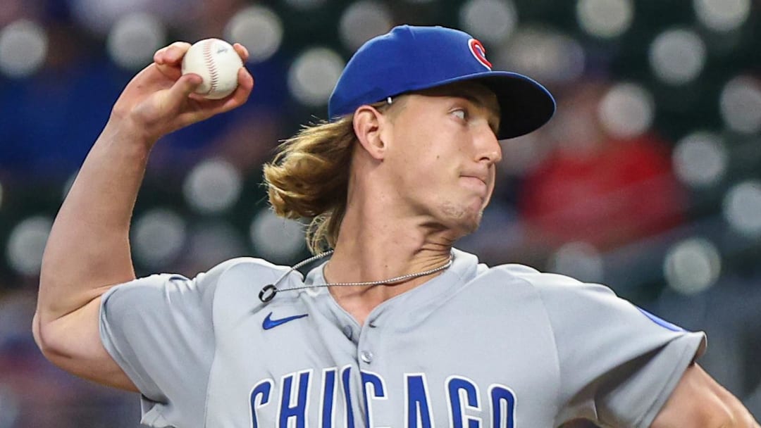 Chicago Cubs pitcher Ben Brown (32) pitches the ball against the Atlanta Braves during the ninth inning at Truist Park.